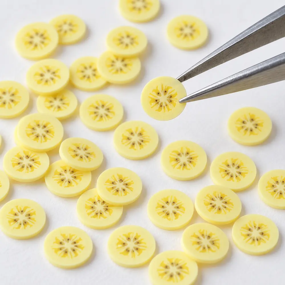 Wholesale 5 mm Banana Polymer Clay Slices for Slime, Nail Art and DIY Craft Decoration tweezer scale detail, product code YX051 thumbnail
