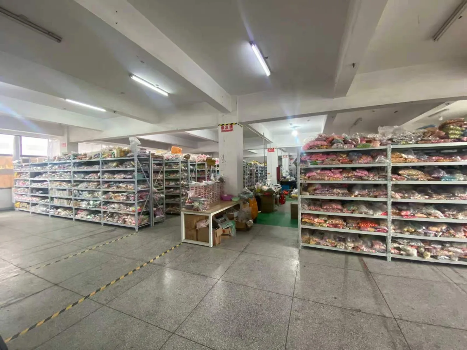 Wide warehouse aisle with product shelving
