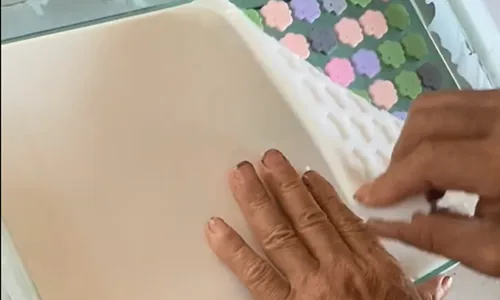 Worker removing pieces from a mold